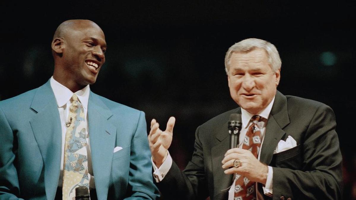 In a Nov. 1, 1994 file photo, former Chicago Bulls great Michael Jordan shares a moment with Dean Smith, his former coach at North Carolina, during ceremonies honoring Jordan at Chicago's United Center. A former UNC player shared recruiting letters Smith sent Monday