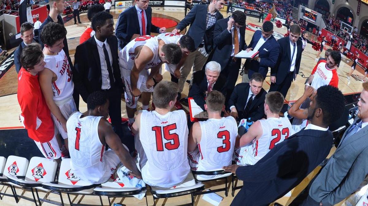 Davidson head coach Bob McKillop talks to his Wildcats during a late second-half timeout against Mercer at Belk Arena on Monday. Davidson won 77-71.