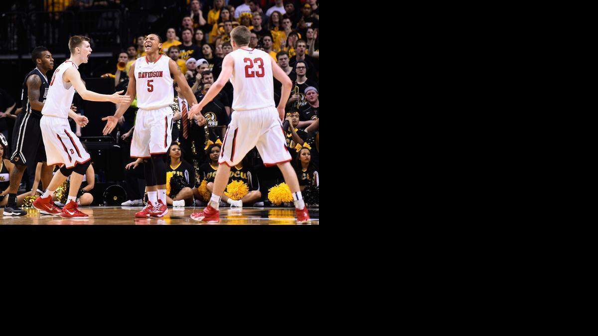 
Davidson’s Jordan Barham (5) reacts to a basket with teammates Oskar Michelsen and Peyton Aldridge during Saturday’s Atlantic 10 men’s semifinal in Brooklyn, N.Y. VCU won 93-73.


