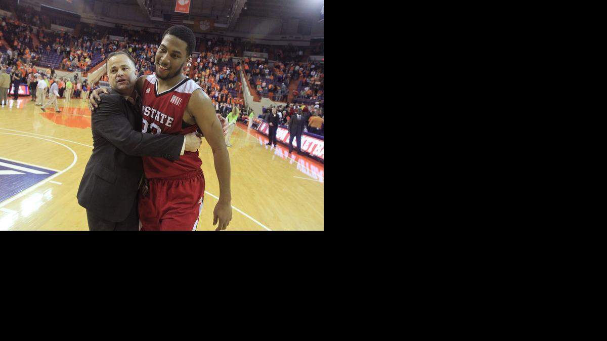 
N.C. State assistant coach Rob Moxley hugs Ralston Turner after the Wolfpack’s 66-61 victory over Clemson at Littlejohn Coliseum in Clemson.
