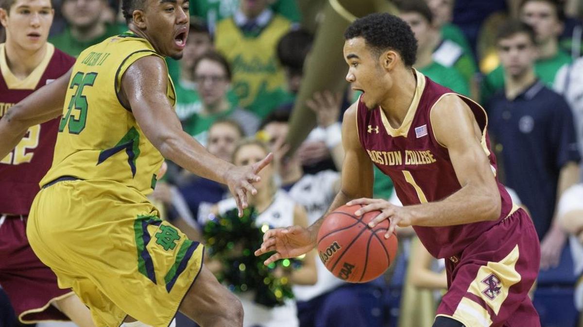 Boston College’s Jerome Robinson (1) drives by Notre Dames Bonzie Colson (35) during Notre Dame's 76-49 win over Boston College in an NCAA college basketball game Saturday, Jan. 23, 2016, in South Bend, Ind. (AP Photo/Robert Franklin)
