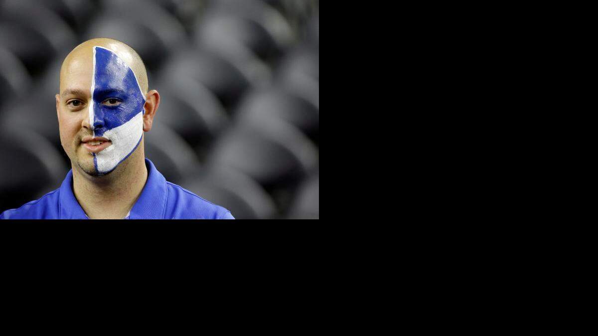 
Duke fan Aaron Breaux waits for the start of a college basketball regional semifinal game between Duke and Utah in the NCAA Tournament Friday, March 27, 2015, in Houston. 
