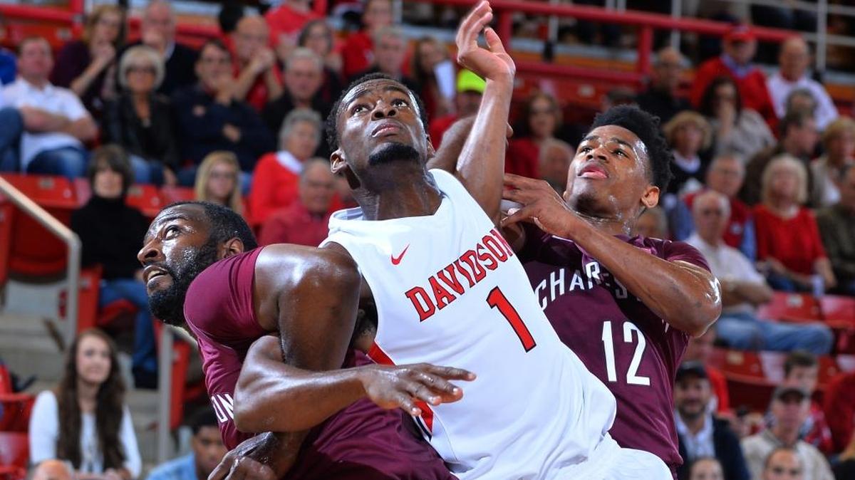 Davidson sophomore forward Nathan Ekwu, center in file photo, scored a career-high 14 points on 6-of-9 shooting and pulled down six rebounds against Duquesne.