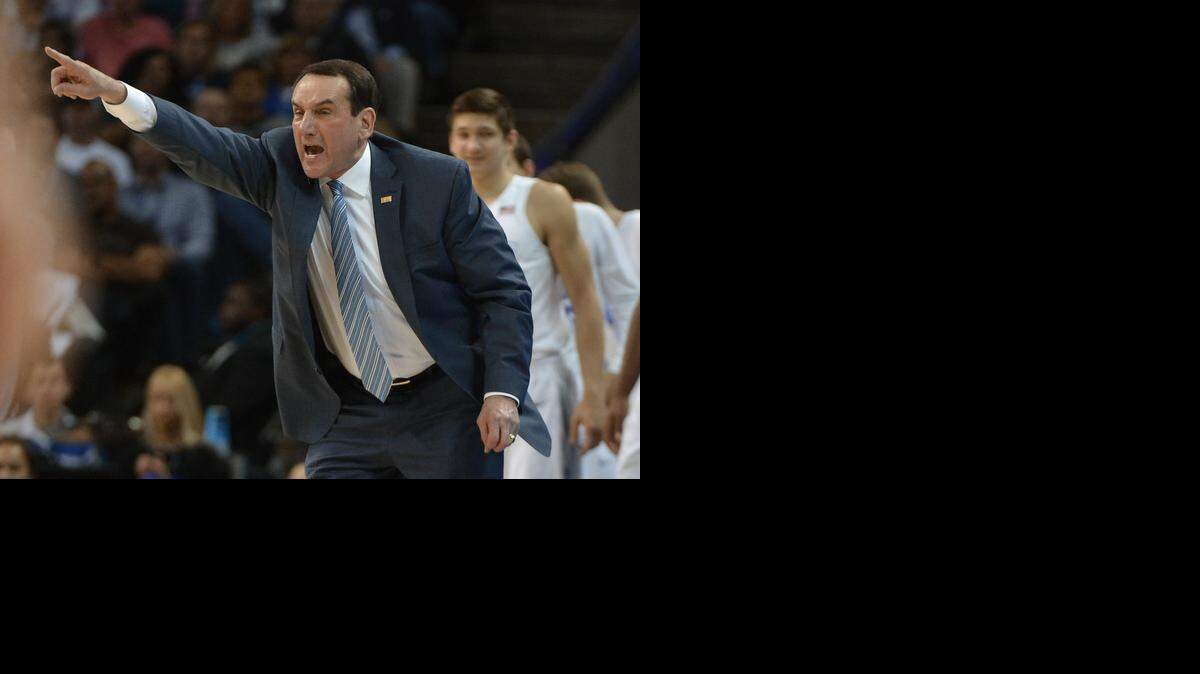 
Duke coach Mike Krzyzewski screams at his team to get back on defense in the first half against Robert Morris at the Time-Warner Cable Arena in Charlotte.
