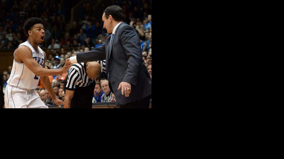 
Duke guard Quinn Cook (2) gets a hand slap from Duke head coach Mike Krzyzewski after causing a turnover near the end of the Feb. 21 win over Clemson.  Cook said the more important factor might be for the Blue Devils against UNC is to ensure that their intensity does not wane at any point.
