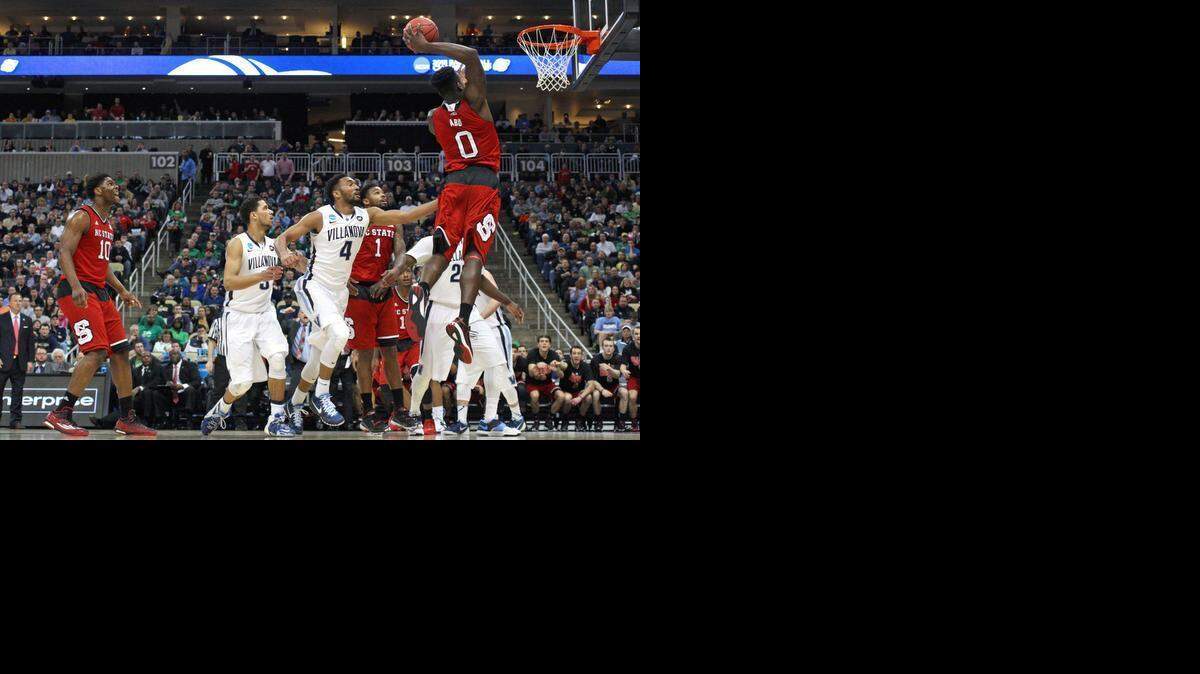 
N.C. State forward Abdul-Malik Abu, shown dunking against Villanova on Saturday, is one of the Wolfpack big men who helped the team reach the Sweet 16. The N.C. State forwards have to keep it going against Louisville’s Montrezl Harrell. 

