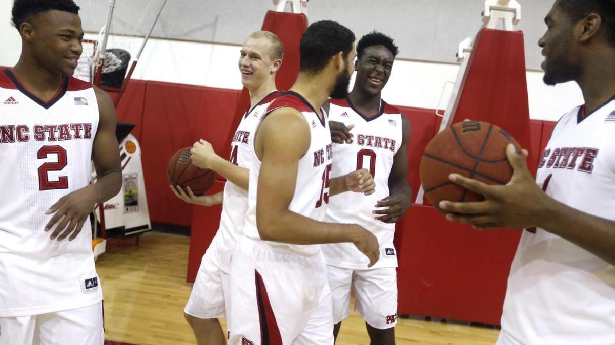 
From left, N.C. State's Torin Dorn (2), Maverick Rowan (24), Cody Martin (15), Abdul-Malik Abu (0) and Lennard Freeman (1) laugh before the N.C. State basketball media day at Dail Basketball Center in Raleigh on Thursday.
