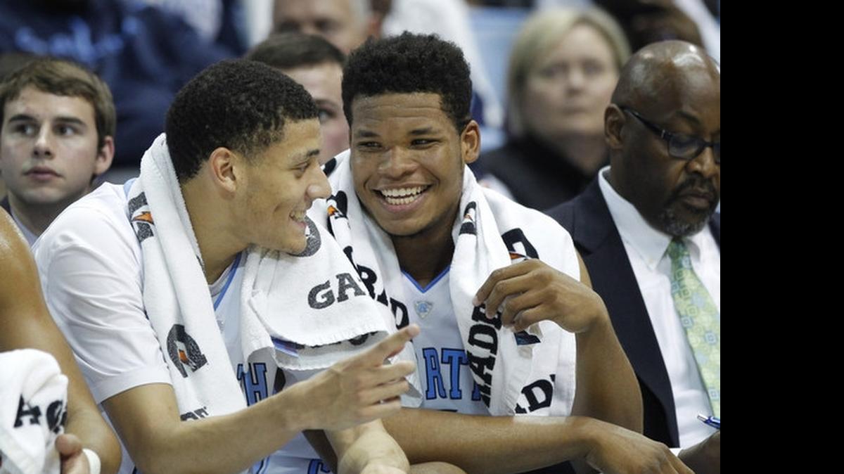 
Justin Jackson (left), Kennedy Meeks and the Tar Heels will play four non-conference games at neutral sites during the 2015-16 season. 
