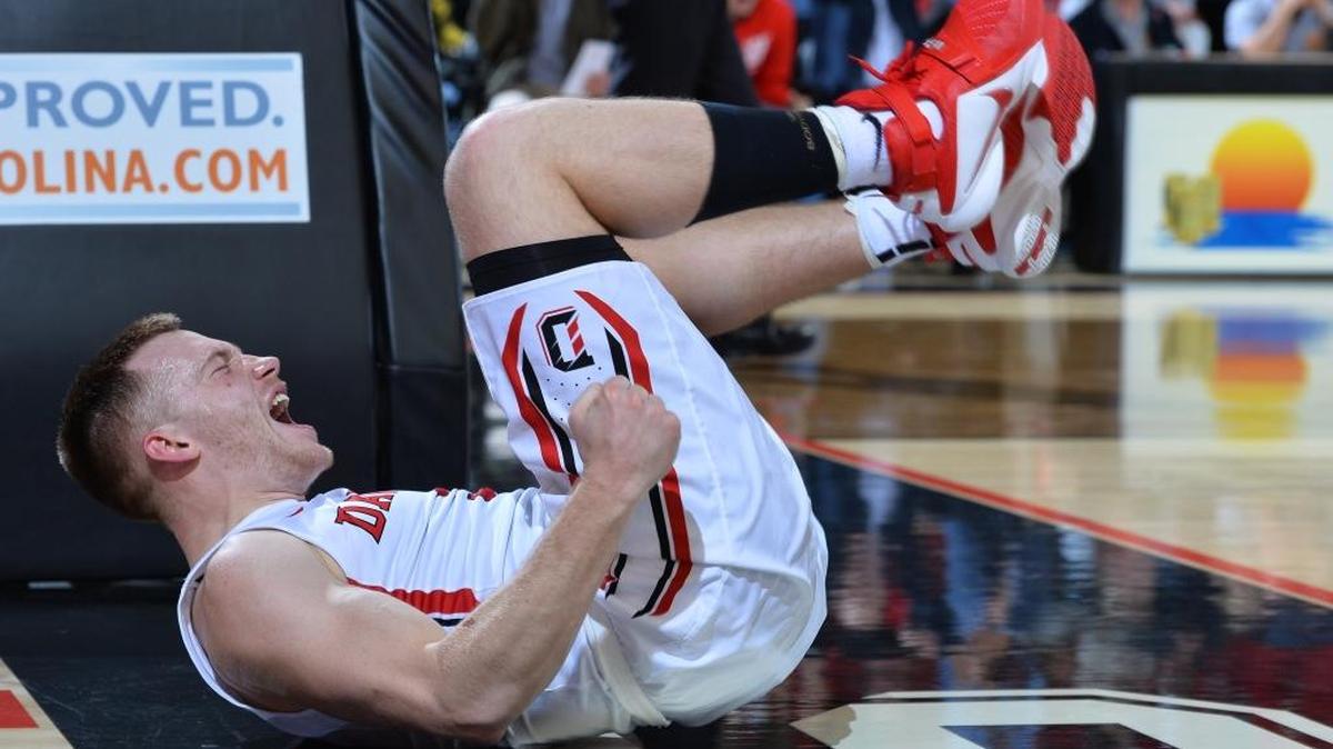 Wildcat Brian Sullivan (3) celebrates as he scores the basket and is fouled in late second half A-10 men's basketball action at the John M. Belk Arena on Tuesday, February 16, 2016 in Davidson, North Carolina. Sullivan finishes the game with 21 points as Davidson won 83-79.