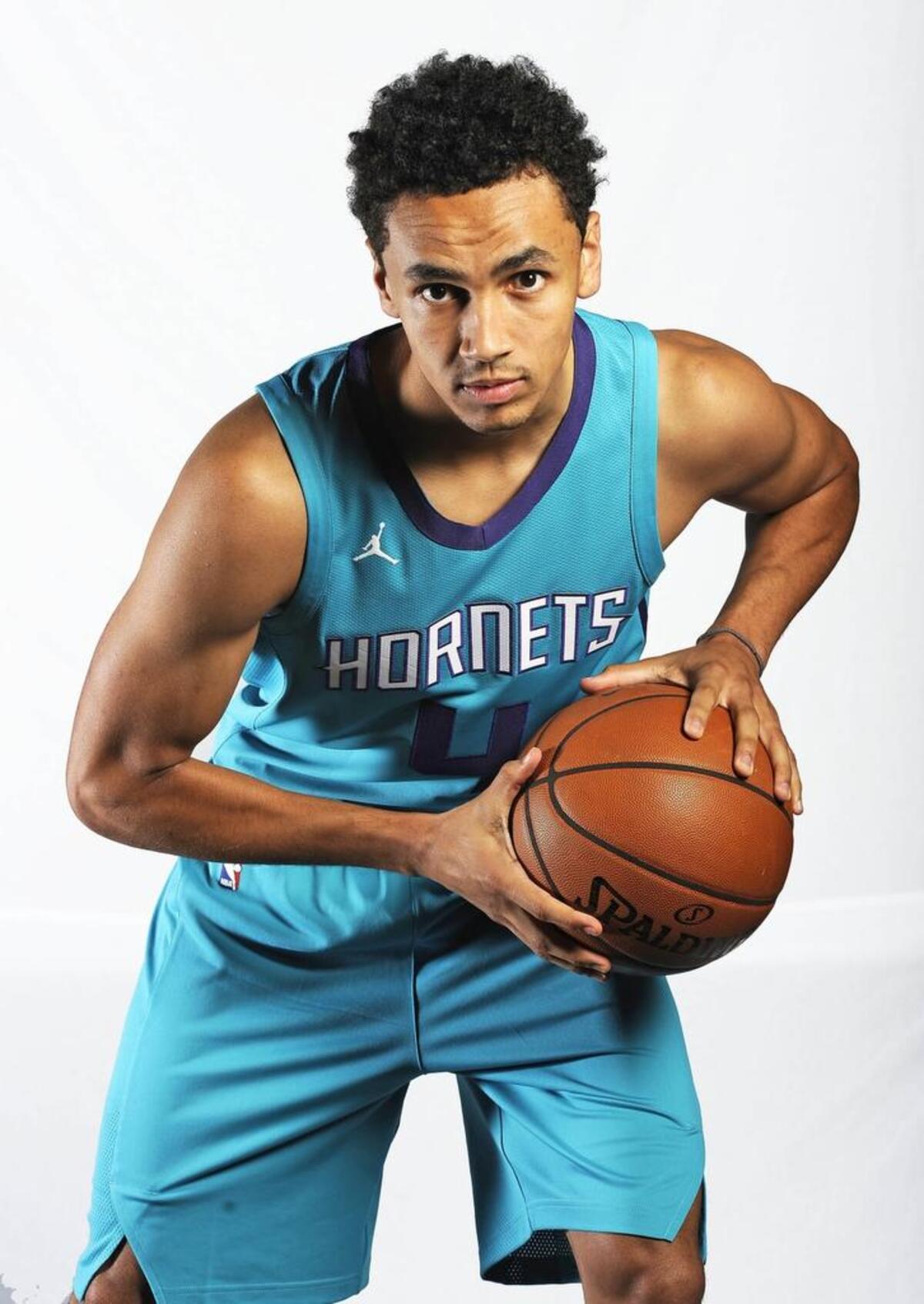 Marcus Paige signed a two-way contract with the Charlotte Hornets in the summer of 2017, allowing him to play for the Greensboro Swarm as well as the Hornets.
