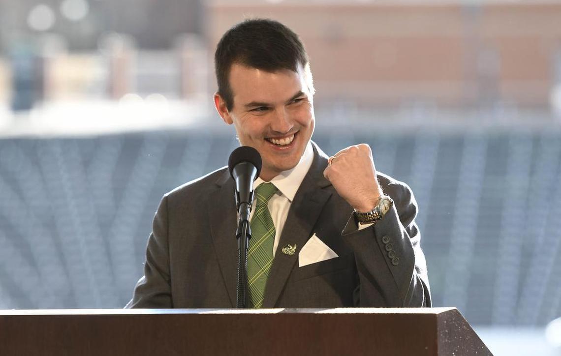 New Charlotte 49ers football coach Will Healy reacts while answering a question during his introductory news conference at Richardson Stadium on Wednesday.