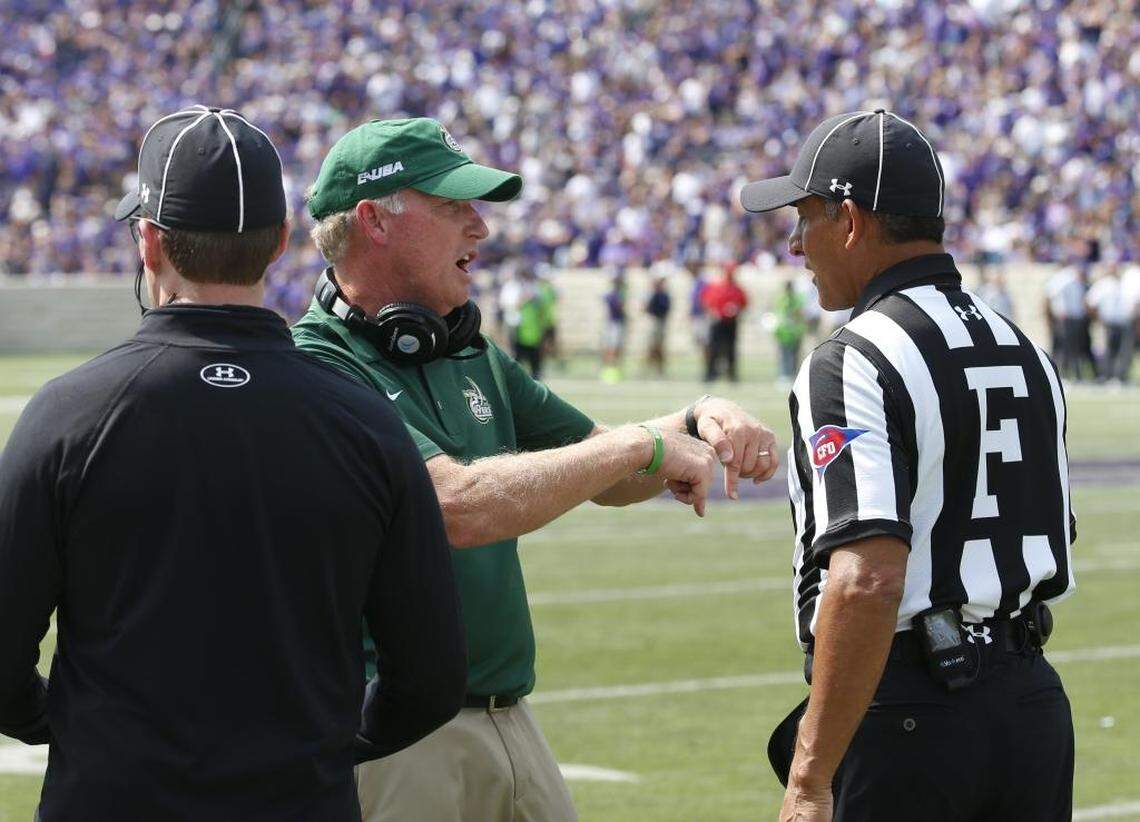 Charlotte coach Brad Lambert argues a call in the second half of Saturday’s 55-7 loss to Kansas State. “Kansas State – that’s a really, really good football team, and there’s a reason they’re No. 19 in the country,” Lambert said.