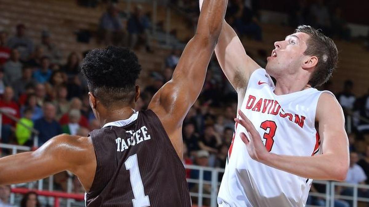 Jon Axel Gudmundsson of Davidson makes a layup over Idris Taqqee of St. Bonaventure late in first half Tuesday night at Belk Arena. Davidson won 68-63.