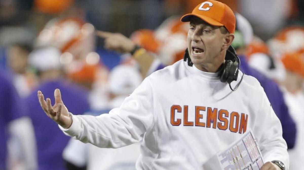 Clemson’s Dabo Swinney planned to quit college coaching in the mid-2000s because he felt the job kept him from being the father and husband his family deserved. His sons talked him out of that decision. Monday, with his oldest son on the team, Swinney coaches the Tigers against Alabama in the college football playoffs.
