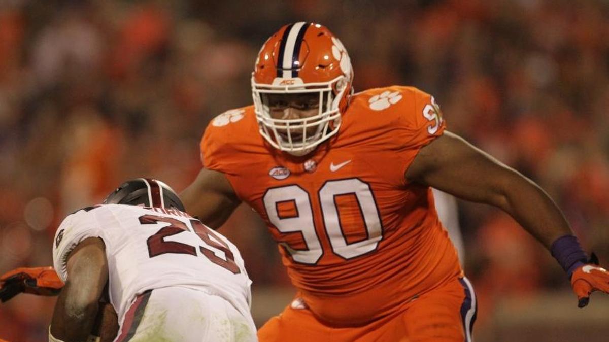 Clemson tackle Dexter Lawrence (right) will lead the Tigers’ defense on Saturday at N.C. State. The game will feature two of college football’s best defensive lines.