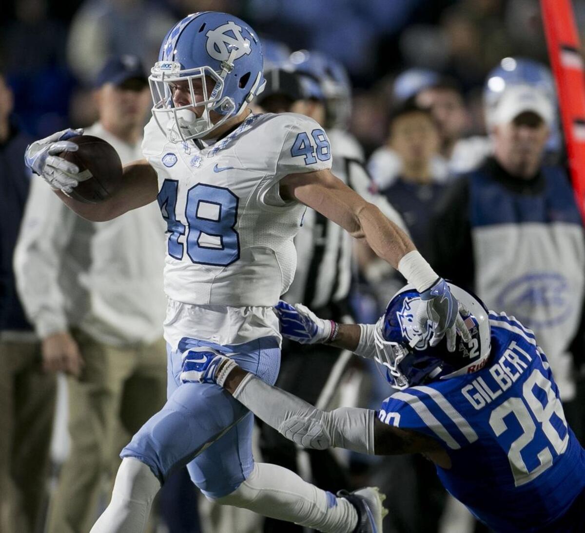 North Carolina’s Thomas Jackson (left) makes a 22-yard reception against Duke to set up a Tar Heels touchdown last season in Durham. He finished the season with 17 catches, 186 yards and four touchdowns