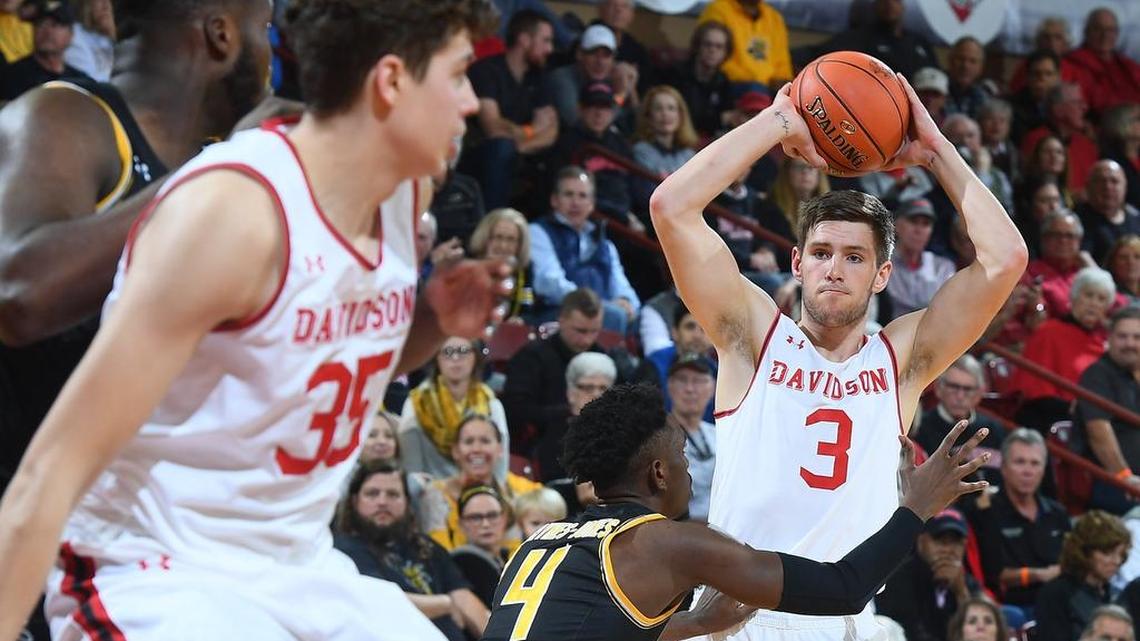 Jon Axel Gudmundsson, right, led Davidson with 33 points and eight rebounds in the Wildcats’ 57-53 victory against Wichita State in the opening round of the Charleston Classic at TD Arena on Thursday night.