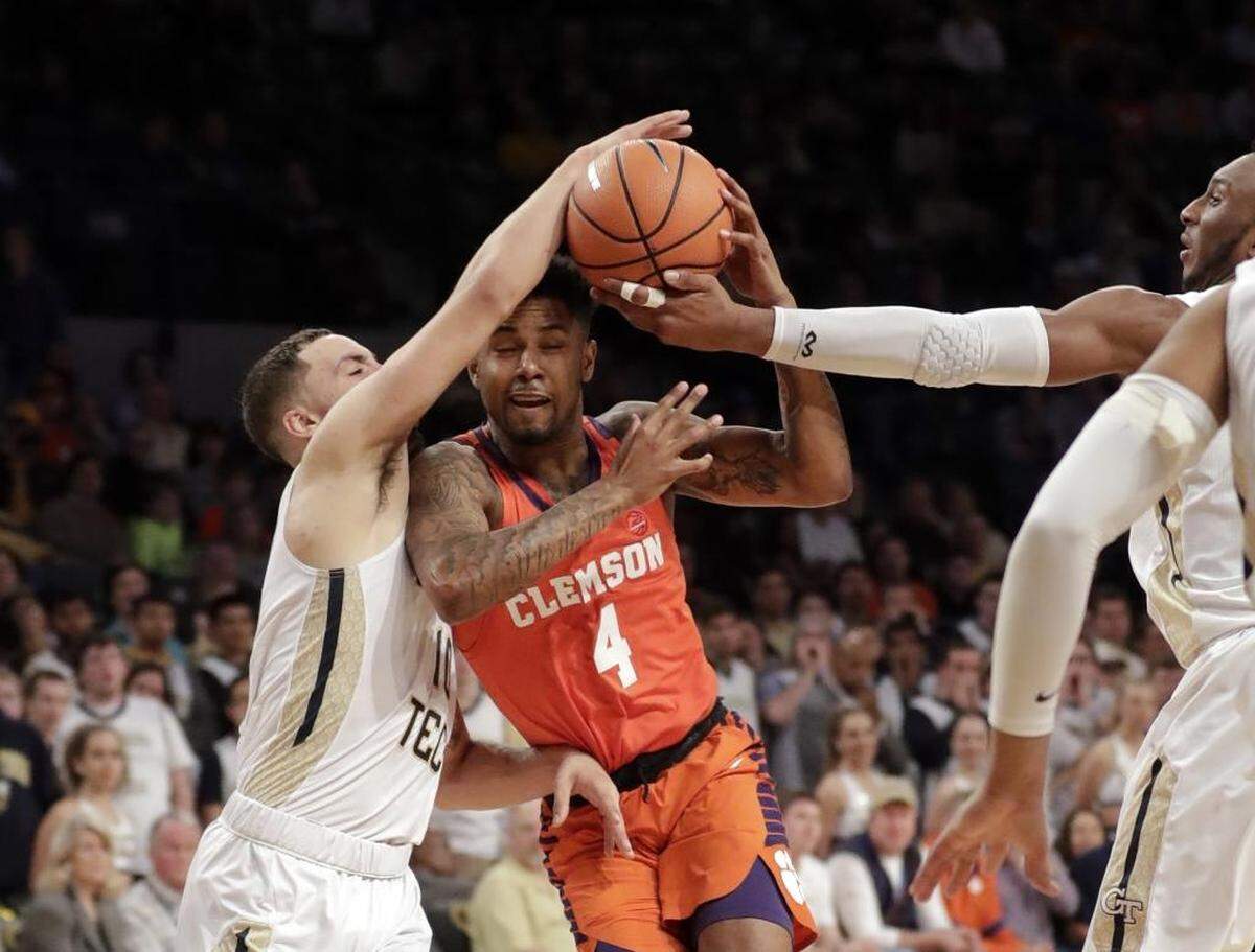 Clemson guard Shelton Mitchell (4) tries to get past Georgia Tech guard Jose Alvarado (10) in the first half of Sunday’s game.