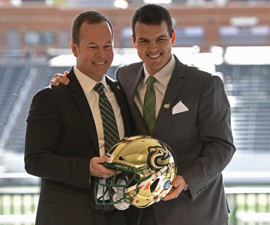 First-year Charlotte 49ers athletics director Mike Hill, left, and new football coach Will Healy pose for a portrait during Healy’s introductory news conference at Richardson Stadium on Wednesday. Healy spent the past three seasons as head coach at Austin Peay.