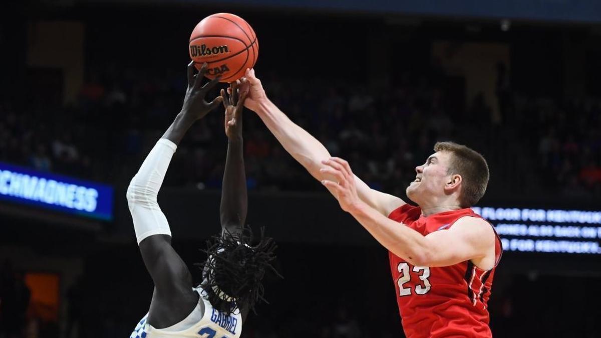 Davidson’s Peyton Aldridge (23) fights for a rebound against Kentucky's Wenyen Gabriel (32) late in the first half of Thursday’s NCAA men’s basketball tournament game in Boise, Idaho. Aldridge and freshman Kellan Grady, Davidson’s leading scorers for the season, shot 8-of-31 from the field as fifth-seeded Kentucky won 78-73.