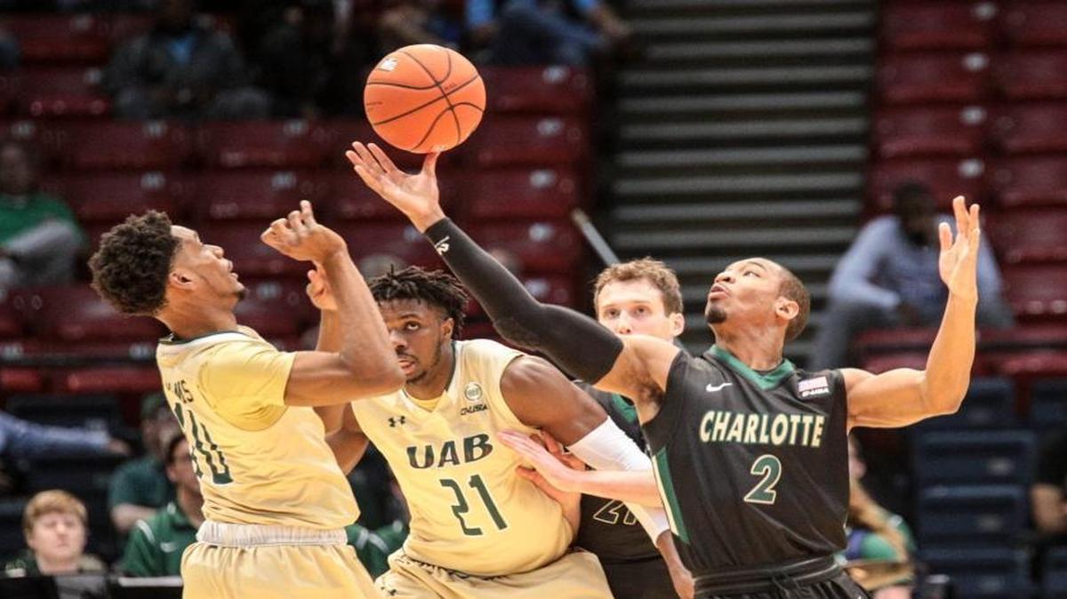 Charlotte guard Andrien White (2) gets a steal during Wednesday’s 74-73 loss to Alabama-Birmingham in the Conference USA tournament.