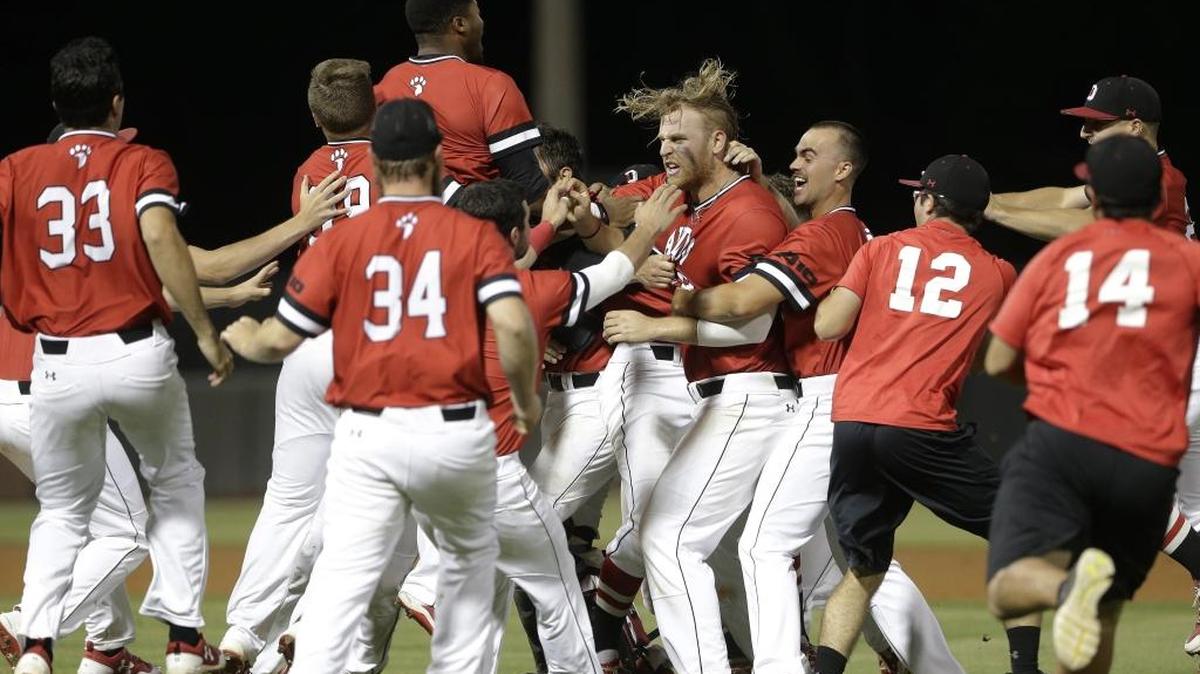 Davidson’s players celebrate after defeating North Carolina 2-1 in Sunday’s game against Chapel Hill Regional host North Carolina. Davidson, in its first NCAA baseball tournament, will advance to the super regional.