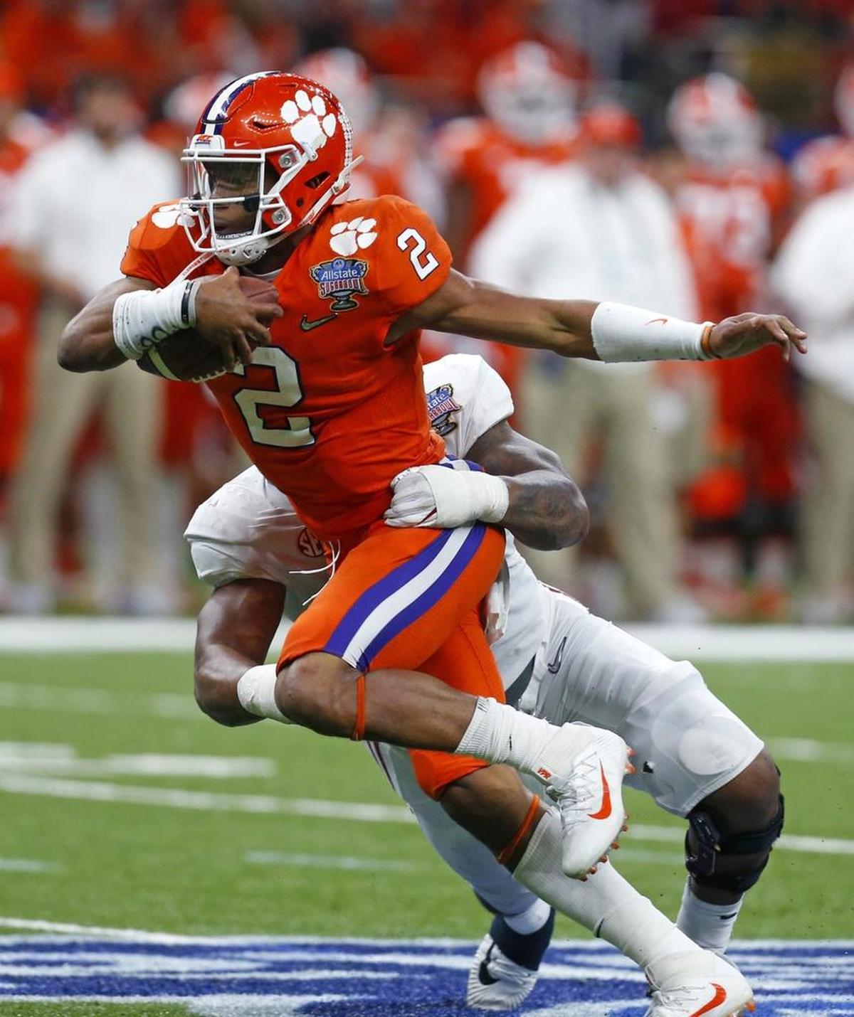Clemson quarterback Kelly Bryant (2) is sacked by Alabama defensive lineman Da'Shawn Hand in the second half of the Sugar Bowl semifinal playoff game in New Orleans Monday night.