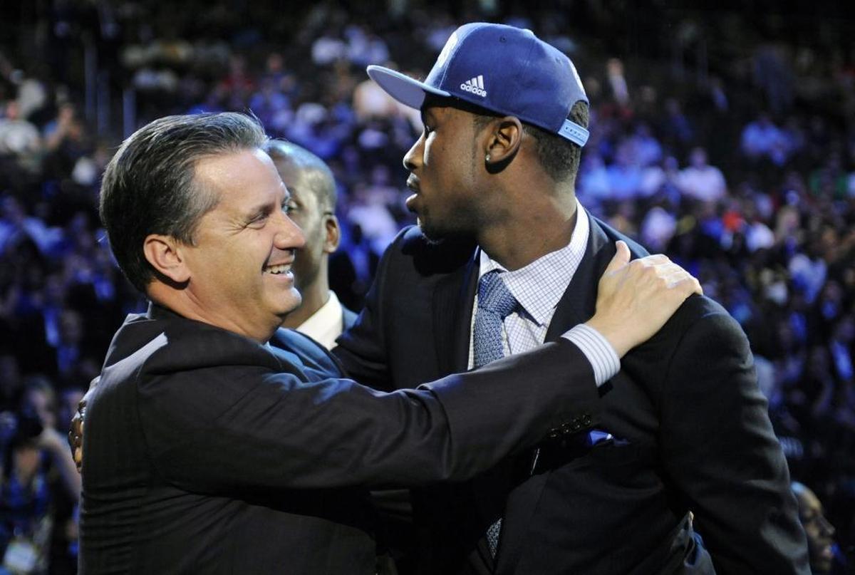Kentucky head coach John Calipari, left, congratulates former Wildcat Michael Kidd-Gilchrist, Charlotte’s first pick (No. 2 overall) in the 2012 NBA draft in Newark, N.J. Kidd-Gilchrist is one of two lottery picks on the Hornets roster, the other being this year’s top pick, Malik Monk.