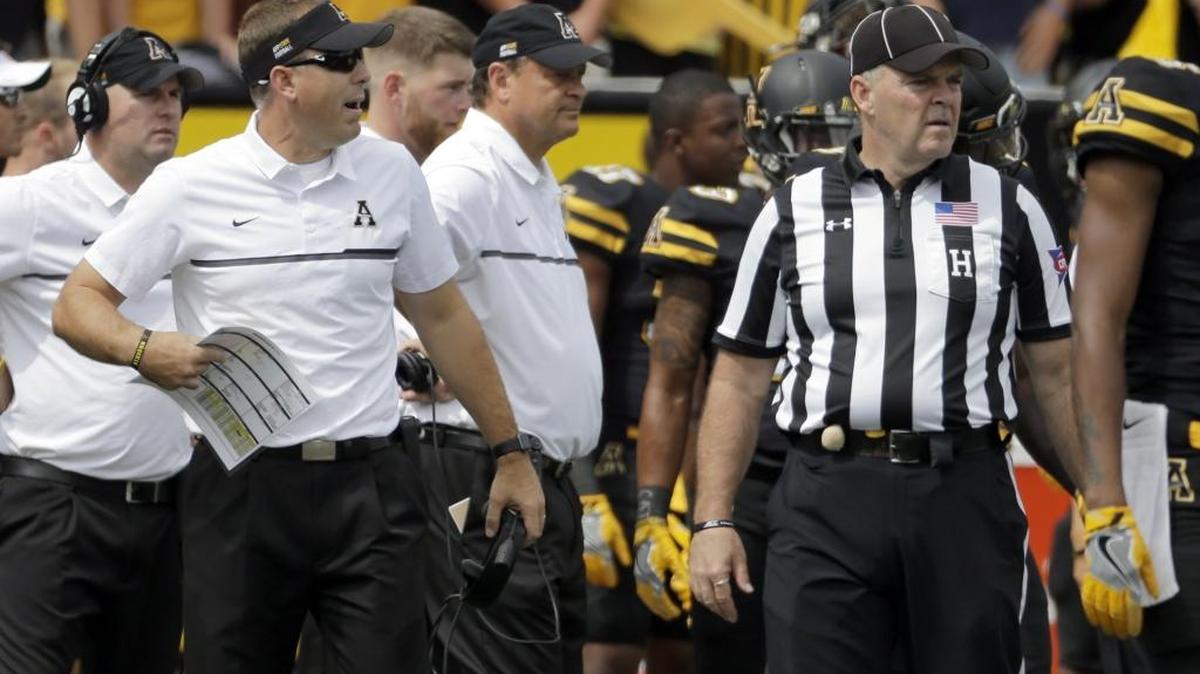 Appalachian State football coach Scott Satterfield, left, and the Mountaineers will play at Akron on Saturday. They’ll try to rebound from last week’s 45-10 loss to Miami.