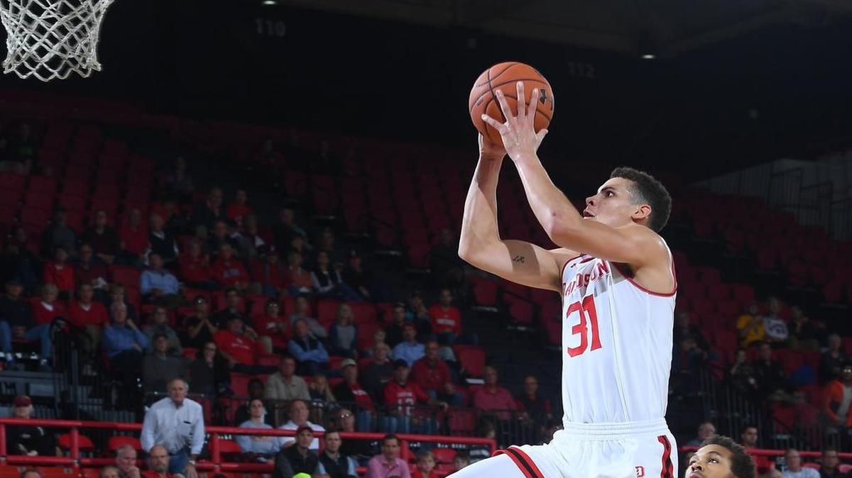 Davidson sophomore Kellan Grady (31) scores two of his 24 points in Tuesday night’s college basketball game against visiting Cleveland State. Davidson won 83-63.