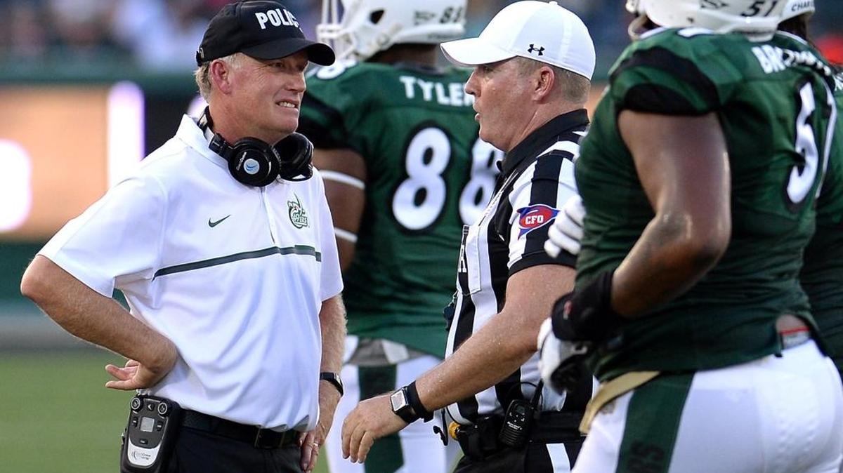 Charlotte 49ers coach Brad Lambert, left, said his team must get off to better starts in the first quarter. In the 49ers’ three games, they’ve been outscored 42-0 in the opening quarter.