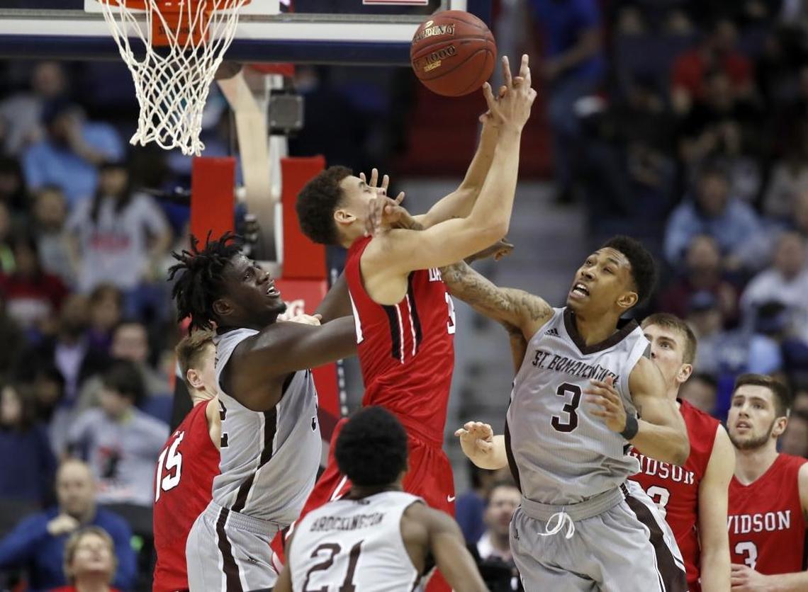 St. Bonaventure center Amadi Ikpeze (32), Davidson guard Kellan Grady (31) and St. Bonaventure guard Jaylen Adams (3) go for the rebound during the first half of Saturday’s Atlantic 10 Conference tournament game in Washington.