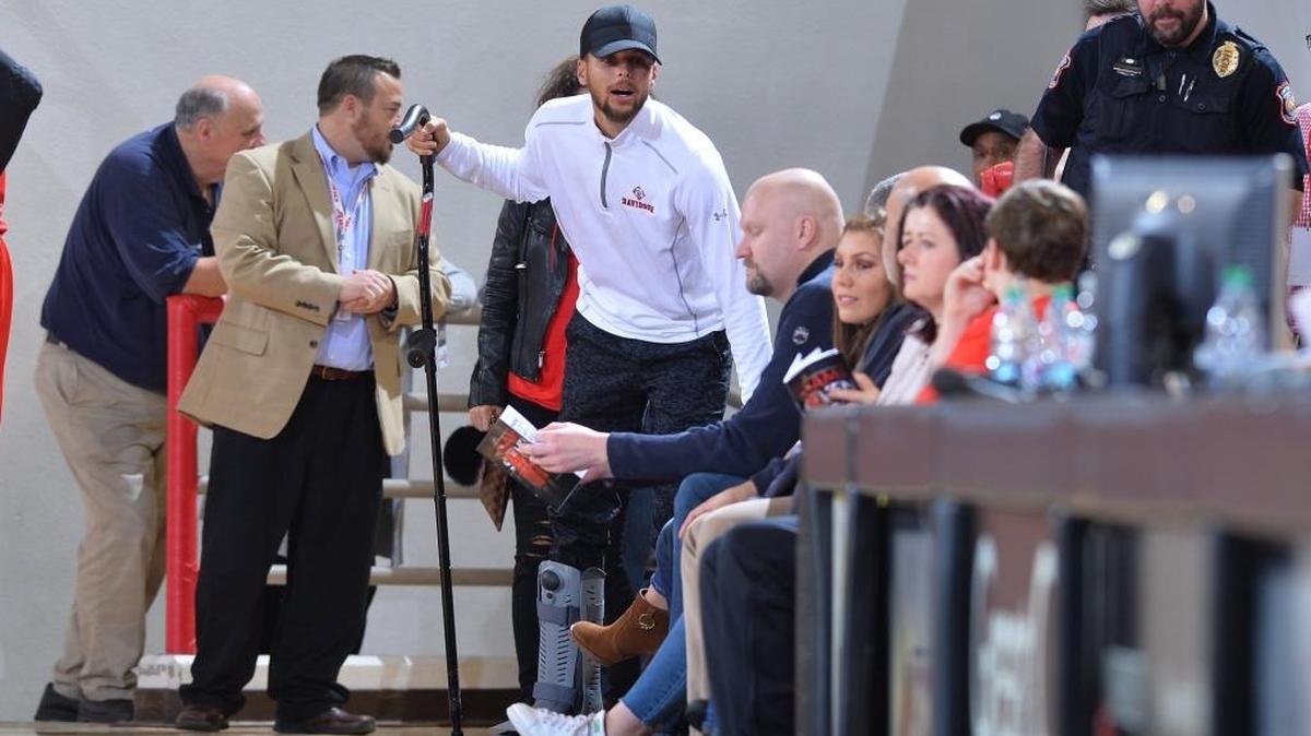 Golden State Warriors star Stephen Curry, the former Davidson All-American, hobbles into Belk Arena to watch the Wildcats play visiting VMI. Curry injured his right ankle against the Pelicans on Monday and is expected to miss Wednesday’s game against the Charlotte Hornets.