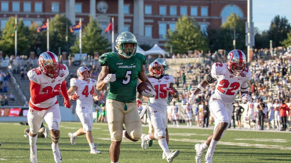 The Charlotte 49ers and running back Aaron McCallister (5) will play at national champion Clemson on Sept. 21.