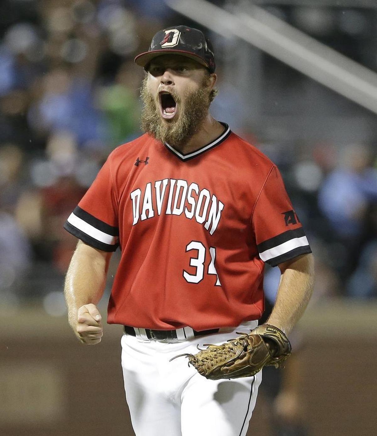 Davidson pitcher Durin O'Linger (34) reacts following an out in the ninth inning of Sunday’s NCAA baseball tournament win over Chapel Hill Regional host North Carolina.