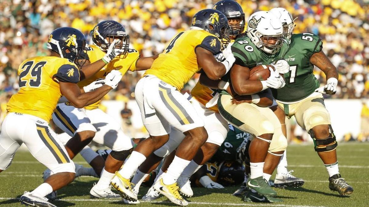 The Charlotte 49ers and running back Robert Washington (20) have started the season 0-3, including a loss to FCS power N.C. A&T.