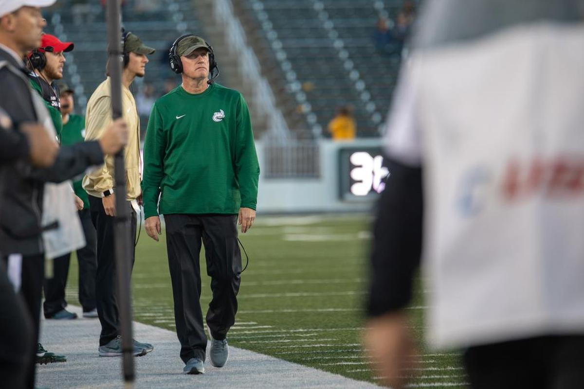 Charlotte 49ers coach Brad Lambert walks the sideline during Saturday’s Conference USA football game against Florida International. It was the 49ers’ final home game. FIU won 42-35.
