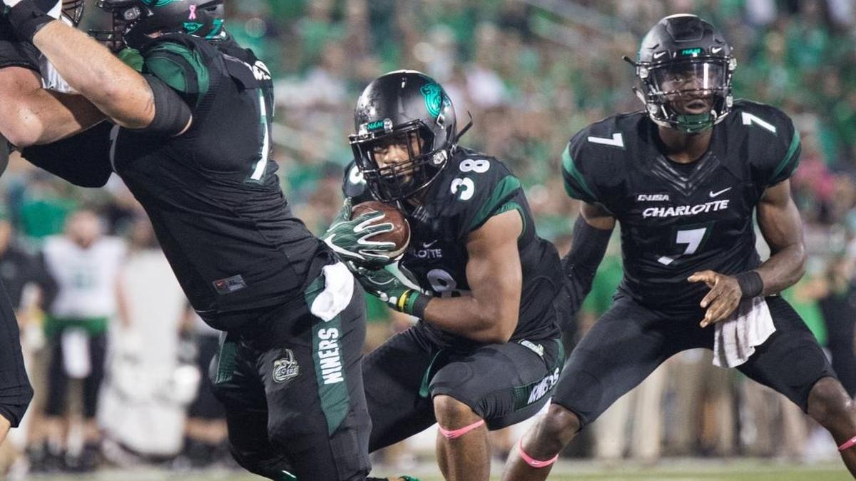 Aaron McAllister (38) is one of three legitimate rushing threats for the Charlotte 49ers.