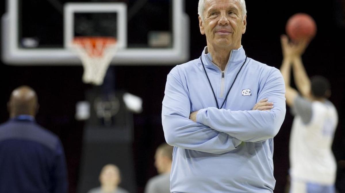 North Carolina coach Roy Williams cracks a smile as he watches the Tar Heels during Thursday’s practice at the Wells Fargo Center in Philadelphia.