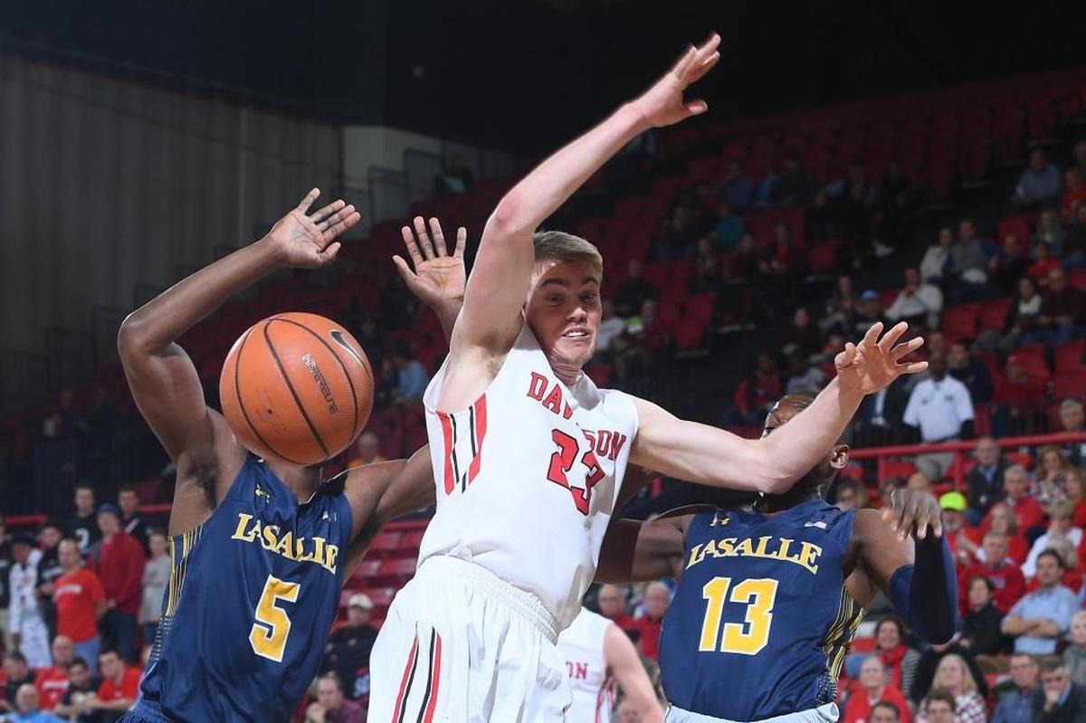 Davidson’s Peyton Aldridge (23) has the ball knocked away by La Salle’s Saul Phiri (13) early in second half of Wednesday’s Atlantic 10 basketball ga,e at Belk Arena. Aldridge finished with 16 points as Davidson won 84-65.