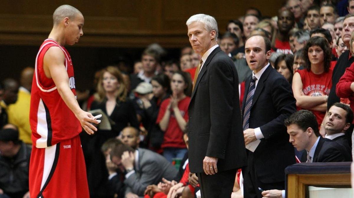 In this picture from the 2008-09 season, longtime Davidson coach Bob McKillop (center) has a word with former All-America guard Stephen Curry as assistant Jim Fox (standing behind McKillop) listens. Curry is now an NBA superstar and McKillop is regarded as one of the best college coaches in the game.