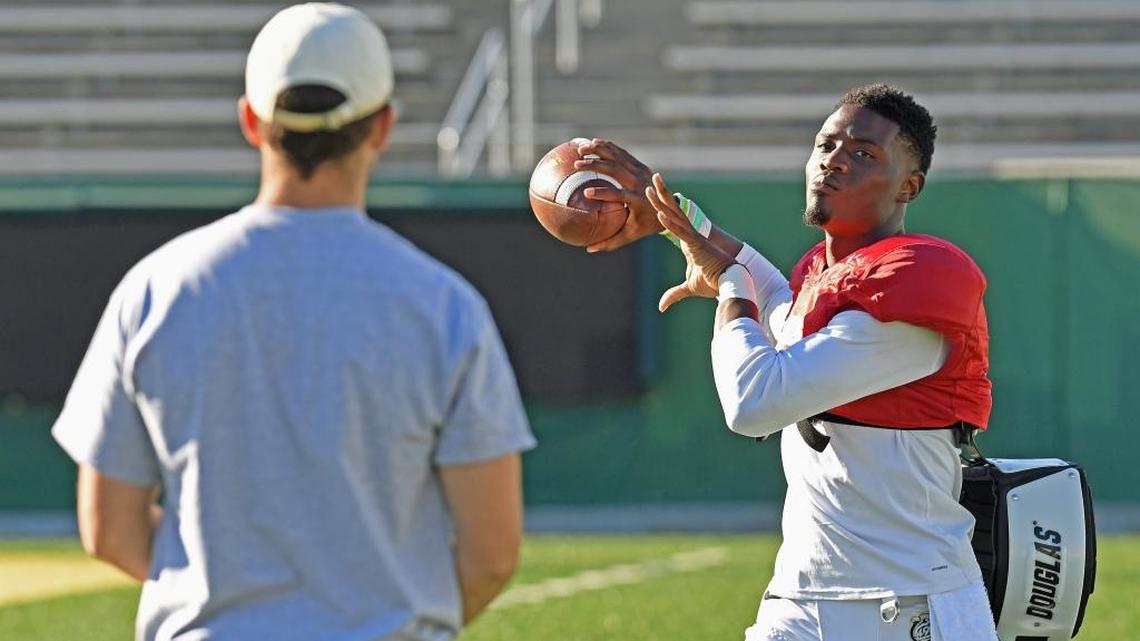 Charlotte 49ers quarterback Hasaan Klugh warms up during a recent practice. Saturday, Klugh and the 49ers will play host to Rice in Conference USA football.