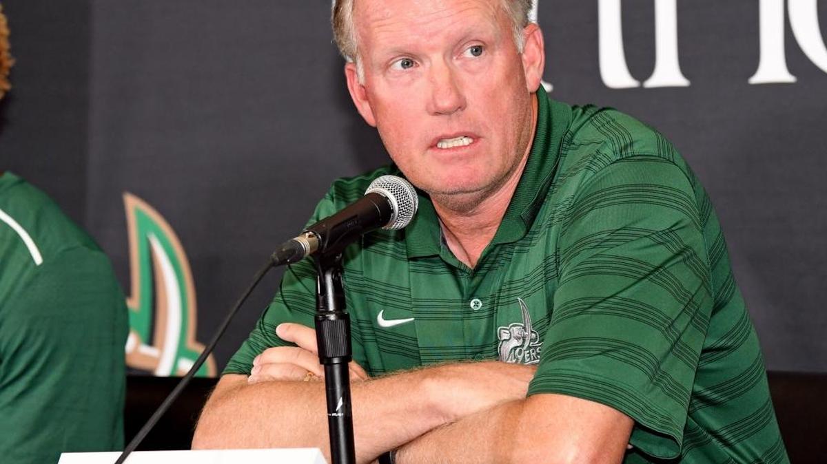 Charlotte 49ers football coach Brad Lambert began his career at Marshall. On Saturday, the Thundering Herd will play host to Charlotte in a Conference USA football game.