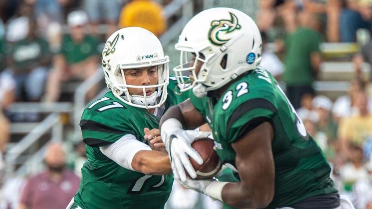 Quarterback Chris Reynolds, left, and running back Benny LeMay will lead the Charlotte 49ers’ offense against Appalachian State on Saturday at Richardson Stadium.