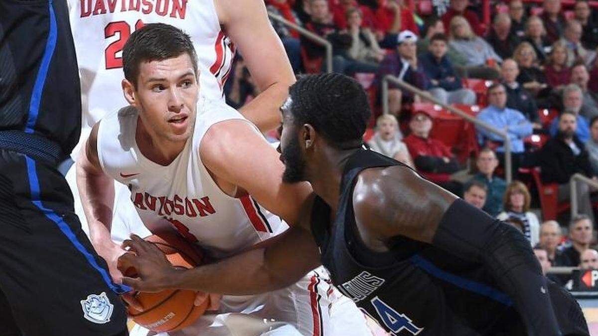Guard Jon Axel Gudmundsson, left, a sophomore from Grindavik, Iceland, paced four Davidson with 18 points on 6-of-9 shooting in Sunday’s win at Fordham. Above, Gudmundsson looks for an outlet in a game on Jan. 3 against Saint Louis.
