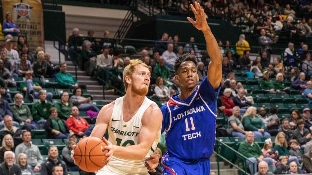 Charlotte freshman guard Cooper Robb, left, scored a team-high 12 points in the 49ers’ 55-40 Conference USA victory against Louisiana Tech on Saturday at Halton Arena. He’s defended here by Louisiana Tech’s Jacolby Pemberton.