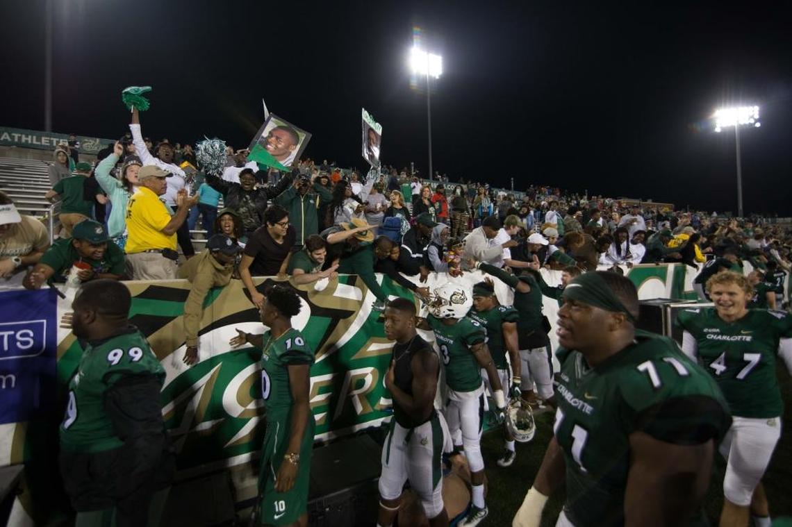 The Charlotte student section at Richardson Stadium celebrates Saturday’s 25-24 homecoming win in overtime against Ala.-Birmingham.