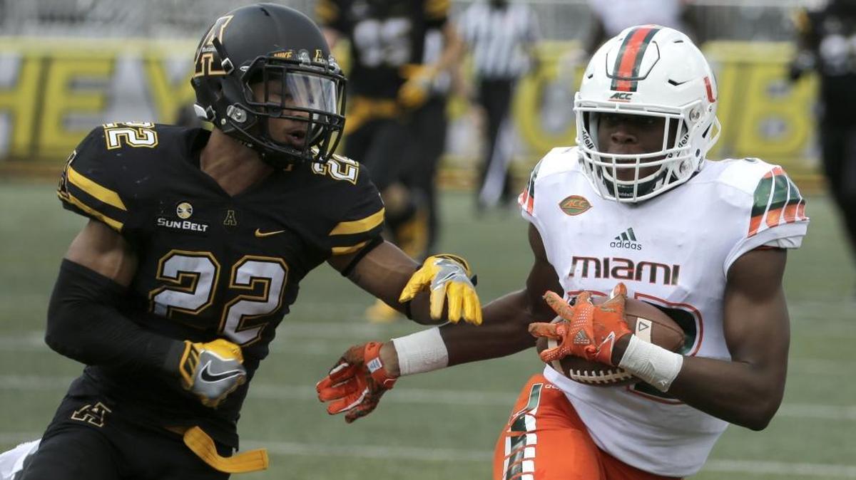 Appalachian State junior cornerback Clifton Duck (left), shown in last season’s nonconference game against Miami in Boone, is the Sun Belt Conference’s preseason defensive player of the year. Duck attended Butler High in Matthews.