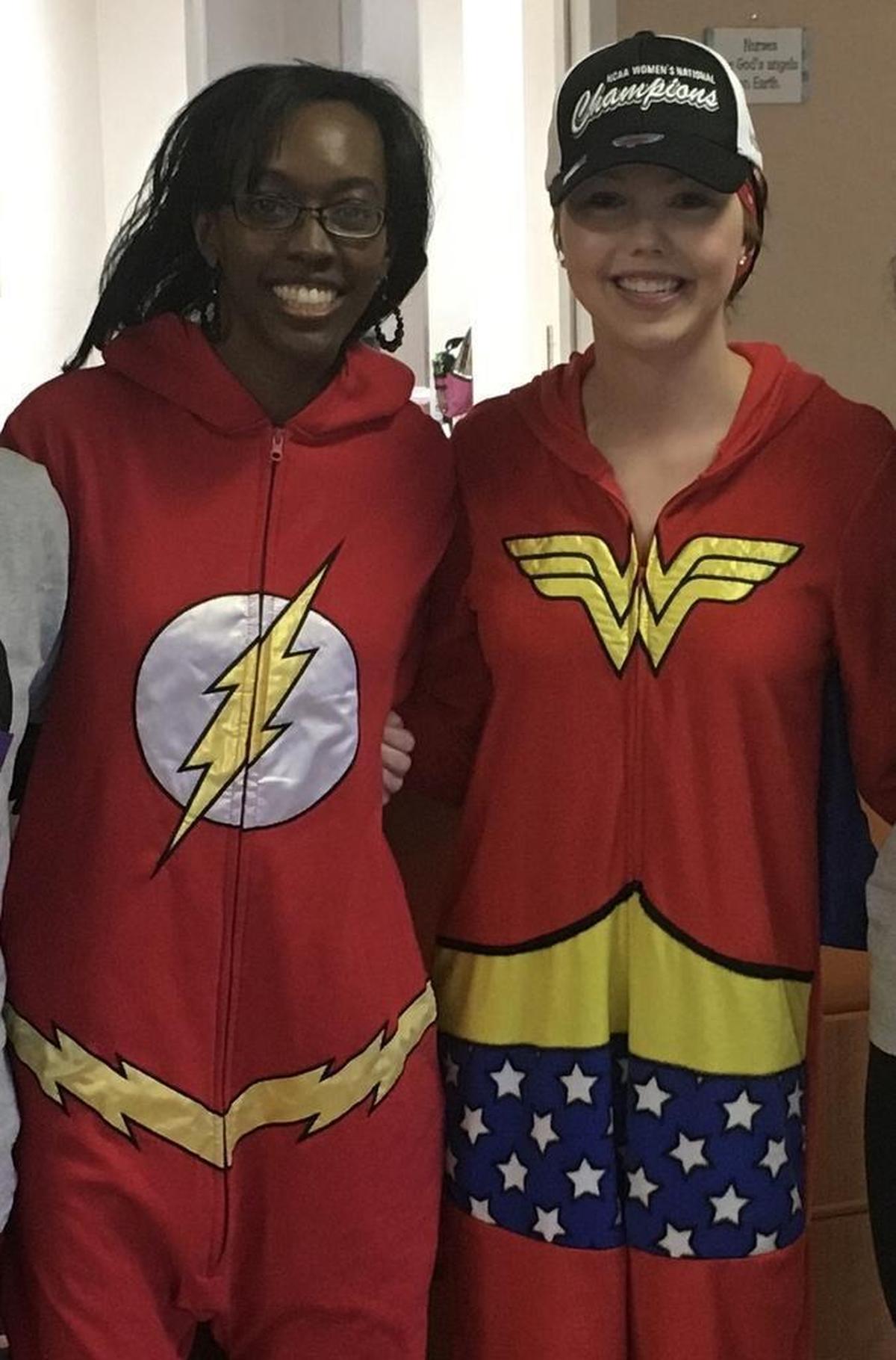 Alexandra Marshall and Dr. Zanetta Lamar of Wake Forest Baptist Medical Center, on Marshall’s last day of chemotherapy.