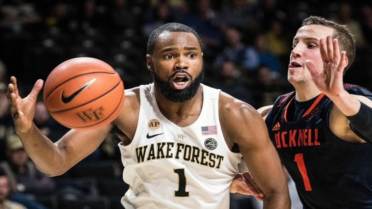 Wake Forest guard Keyshawn Woods (left) is playing a key role for the Deacons after transferring from Charlotte, and his current and former schools meet Tuesday.